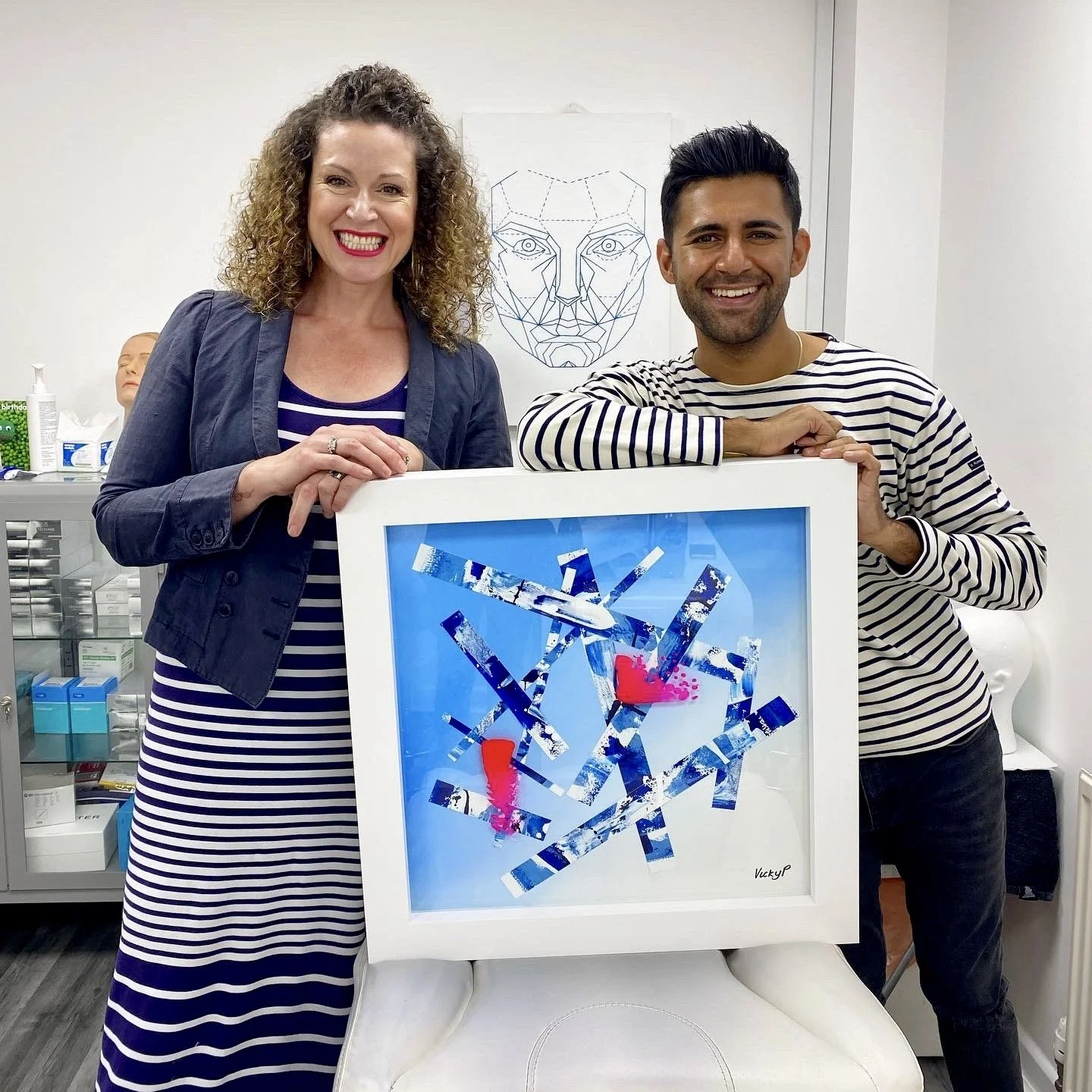Contemporary commissioned artwork by Vicky Paul displayed in an aesthetics clinic interior