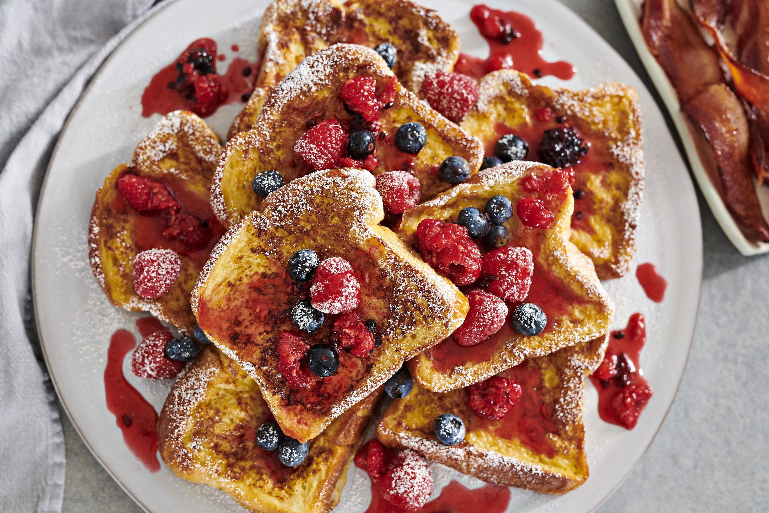 Cinnamon French Toast with Berries and Powdered Sugar