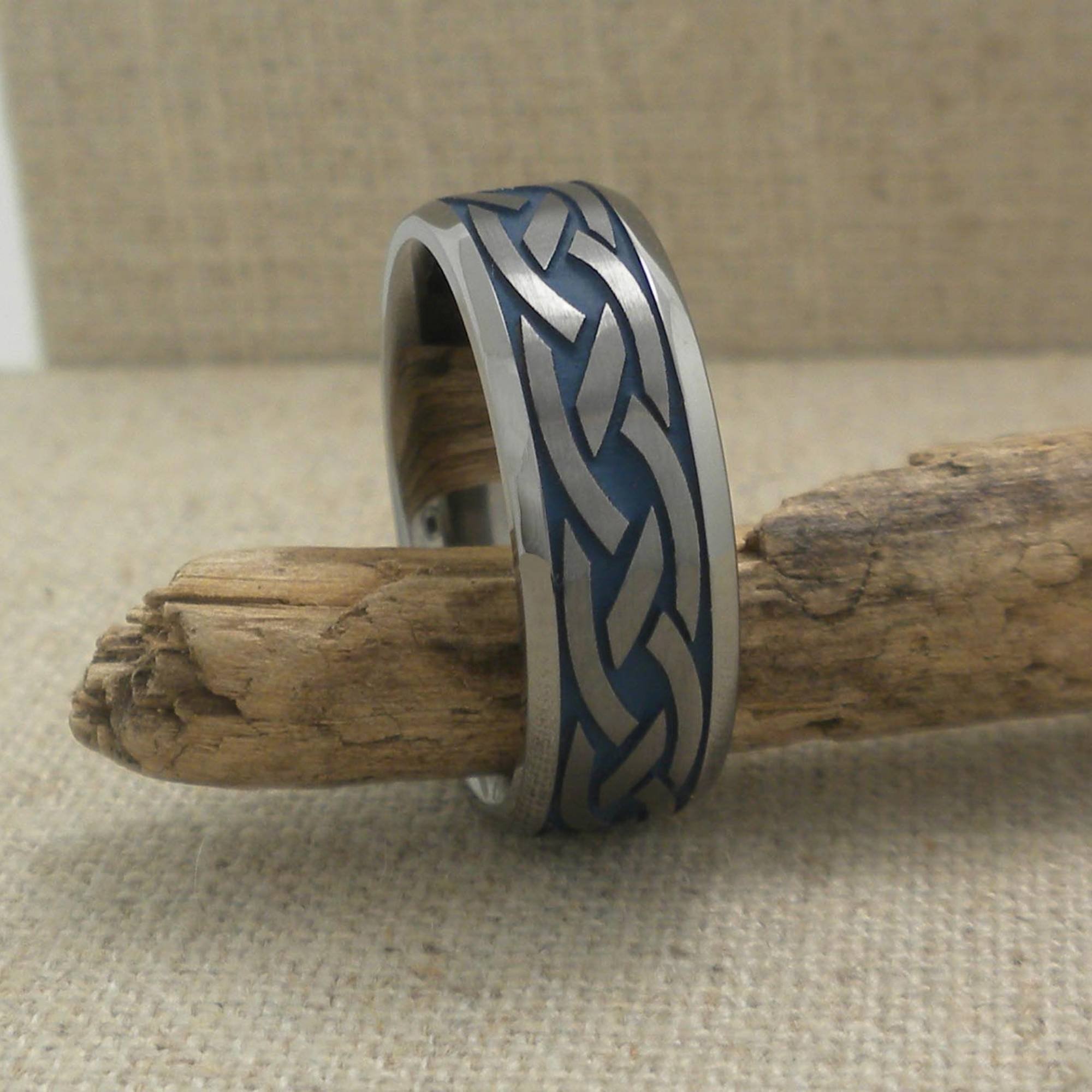 Celtic Knot Wedding Ring in Tantalum with Blue Background