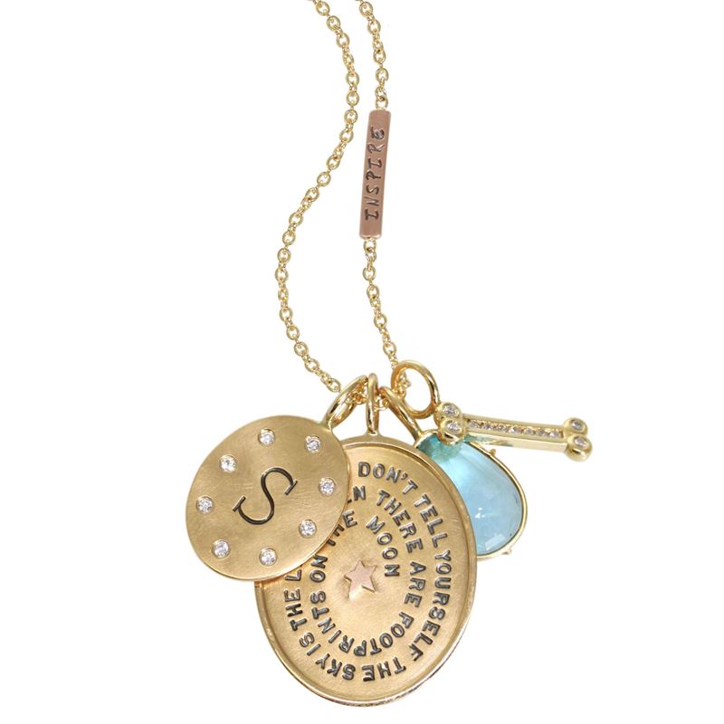 Heather B. Moore personalized jewelry features a freehand technique where each character is hand stamped.