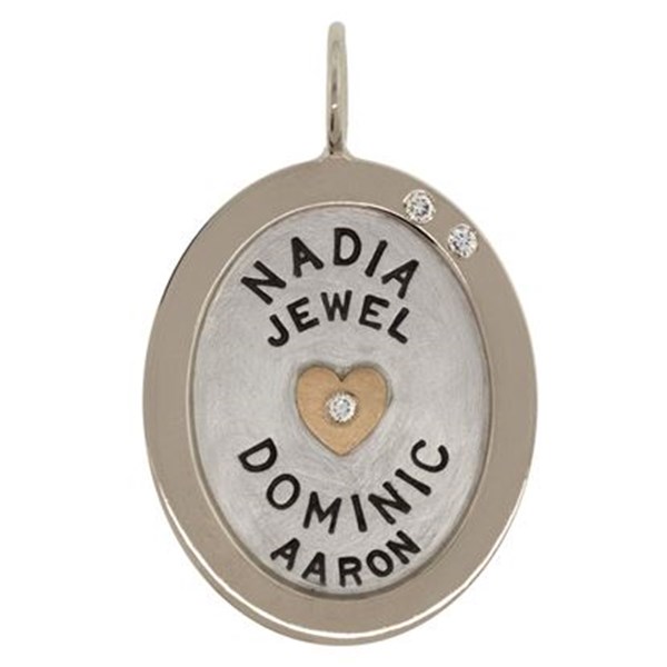 Heather B. Moore personalized jewelry features a freehand technique where each character is hand stamped.
