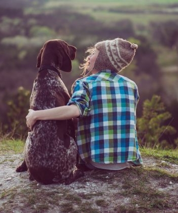 Woman-and-her-dog-posing-outdo-125234645-560x420.jpg