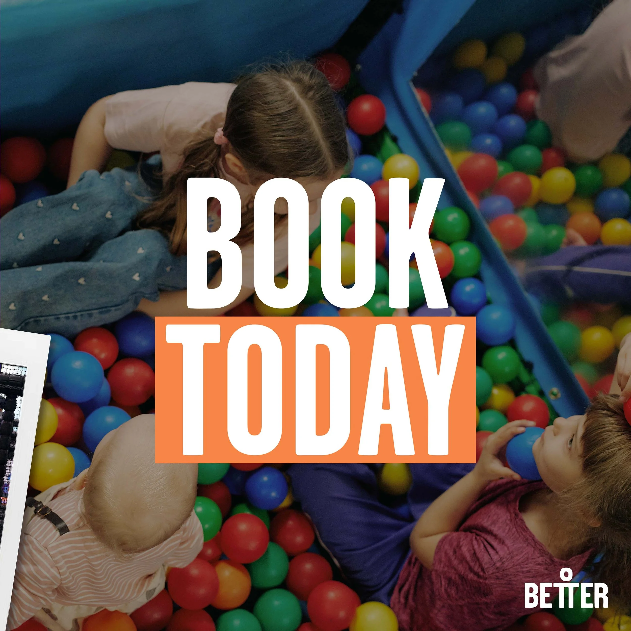 Children playing in a colorful ball pit with red, blue, yellow, and green balls.