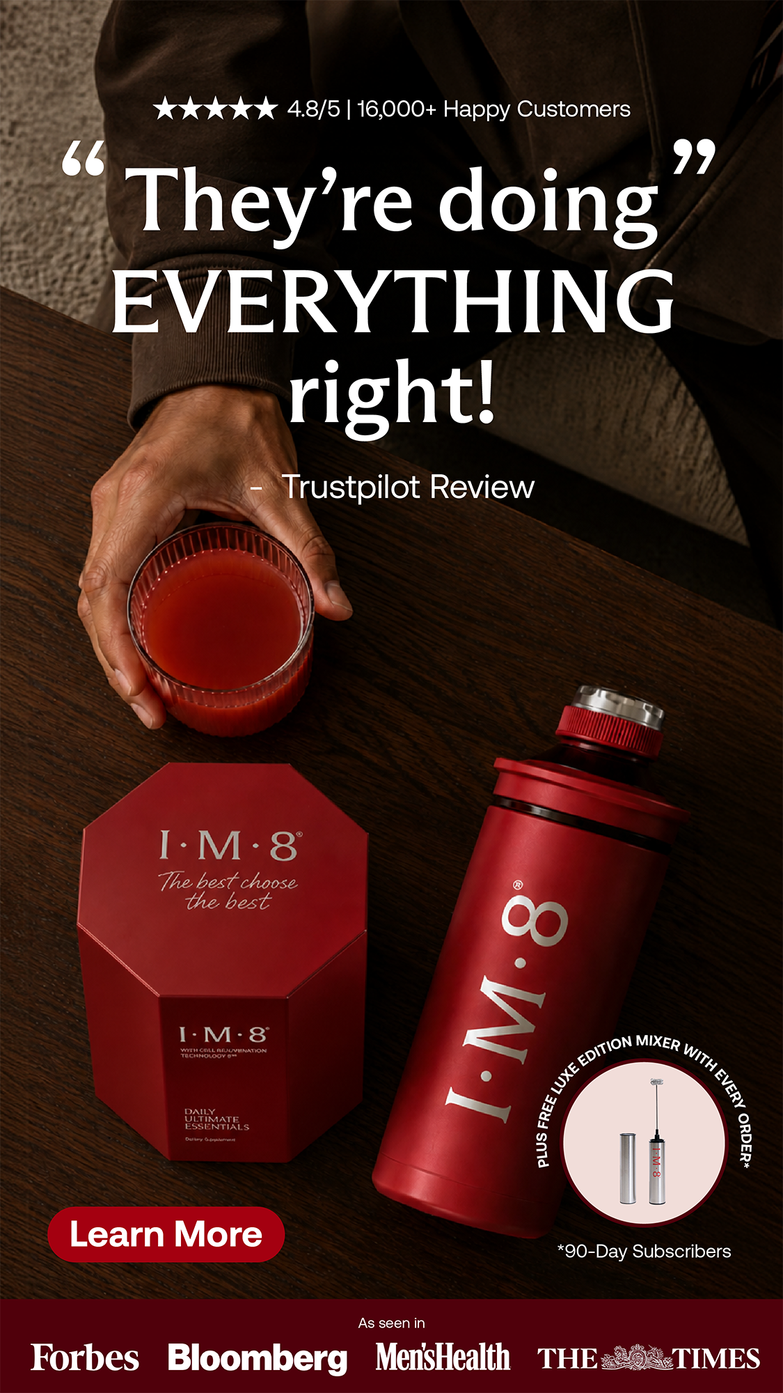 An advertisement featuring a red portable blender, a glass of red drink, and a red box with the logo "I·M·8" on a wooden surface. Text highlights customer satisfaction and product features.