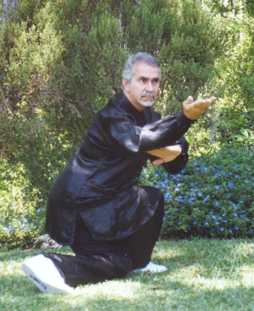 Sifu Paolillo in snake posture, late 90s