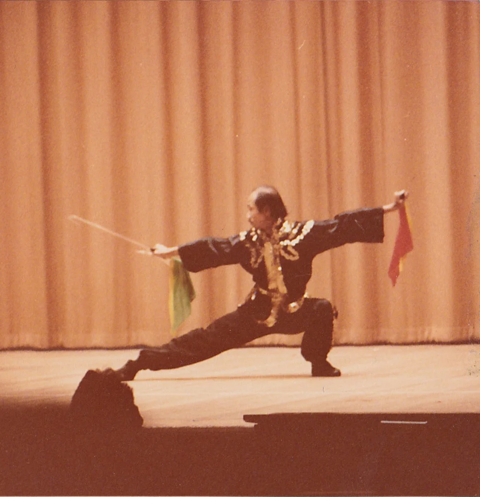 Grandmaster Chan Pui performs double tiger hooks at the John Hancock Hall in 1976. Boston, MA.