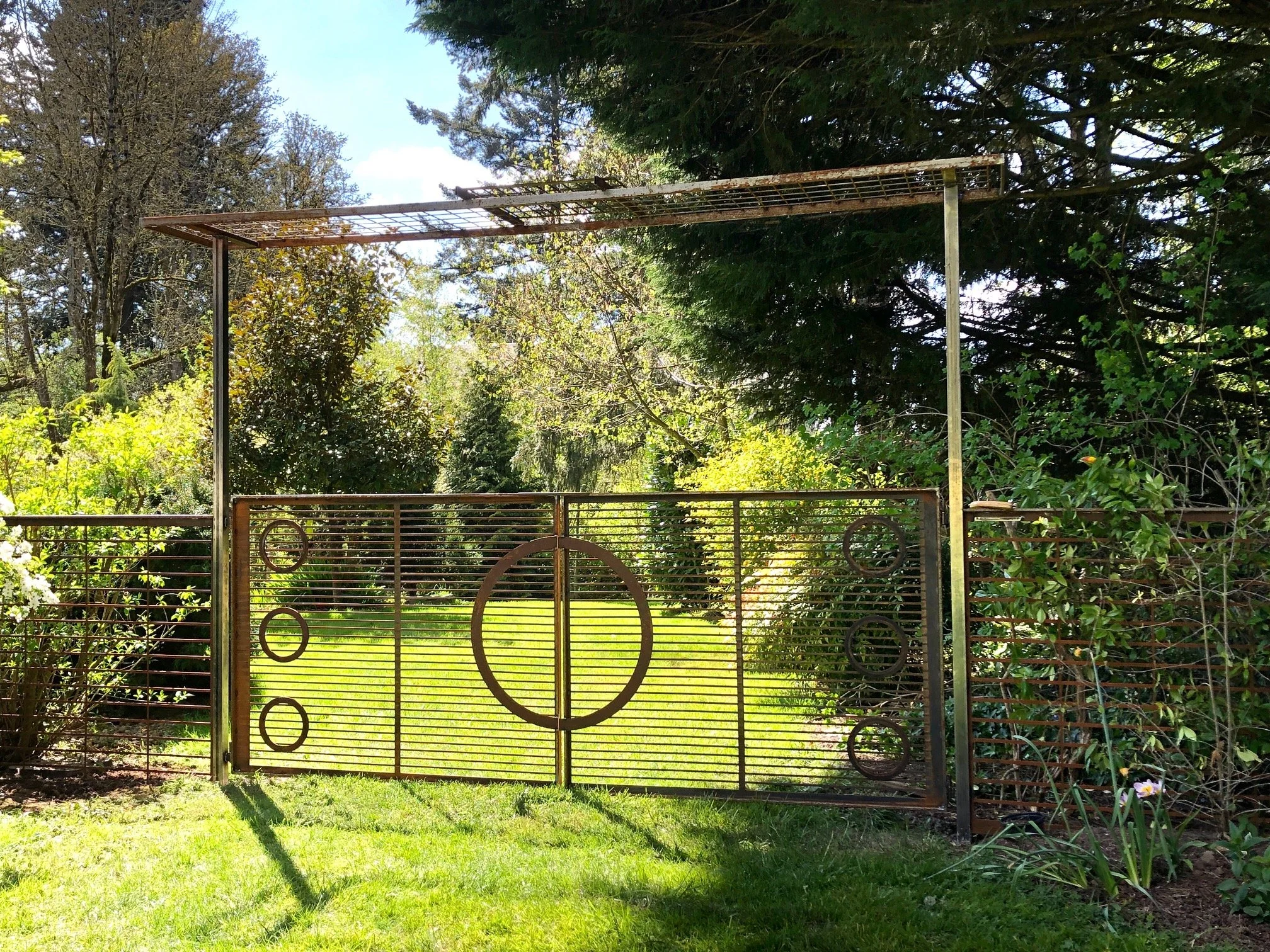 Double door gates for a modern Japanese style garden.