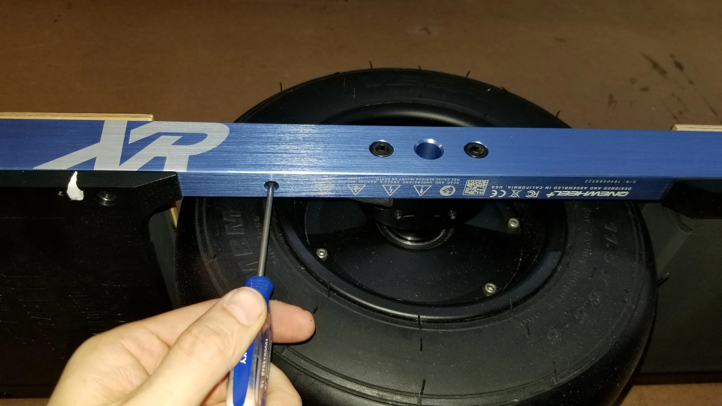 Remove Motor Cable Retainer (Left Side)