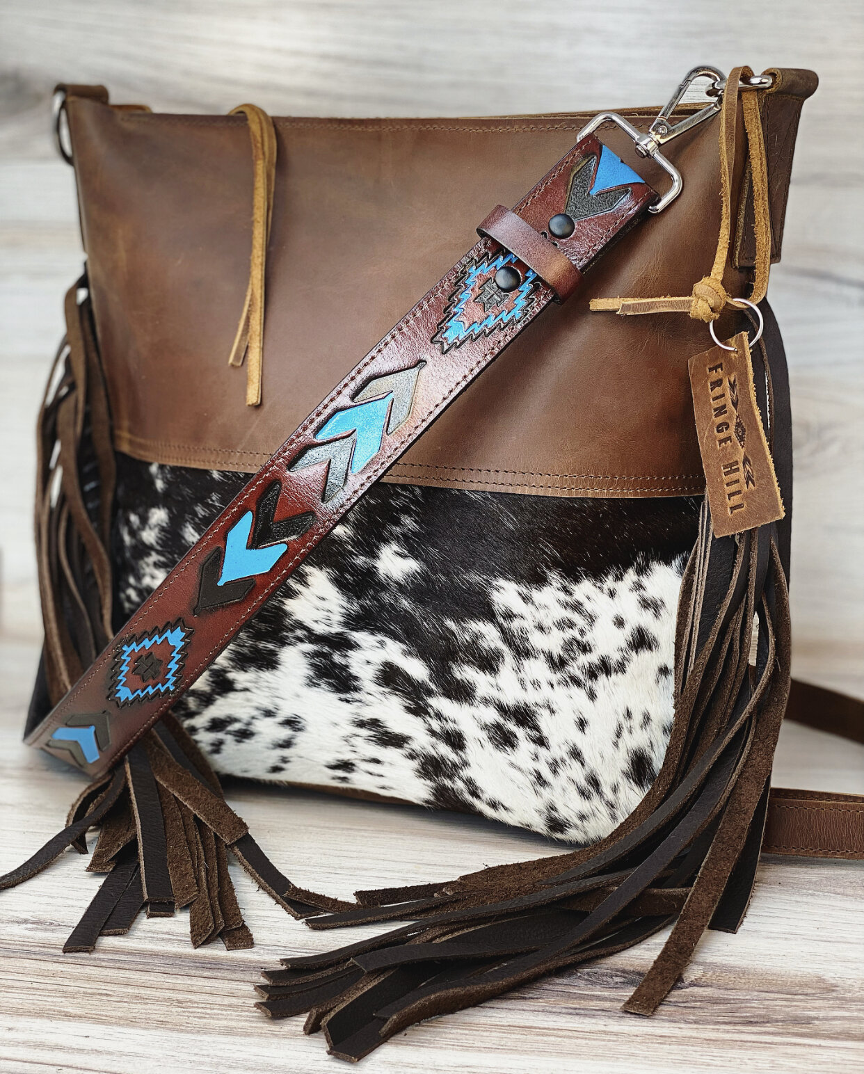 cowhide purse with fringe