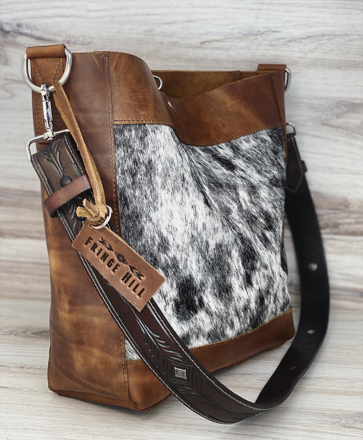 Faux axis deer cowhide bohowestern bag with long black fringe and tassel  pack up your tablet in style, cowgirl fashion