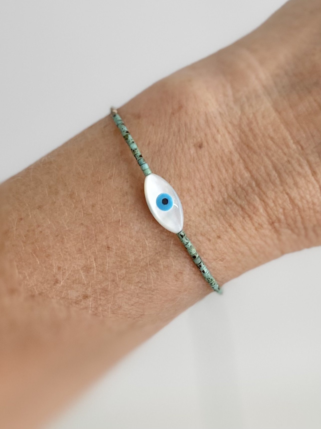 EVIL EYE PEARLESCENT BRACELET