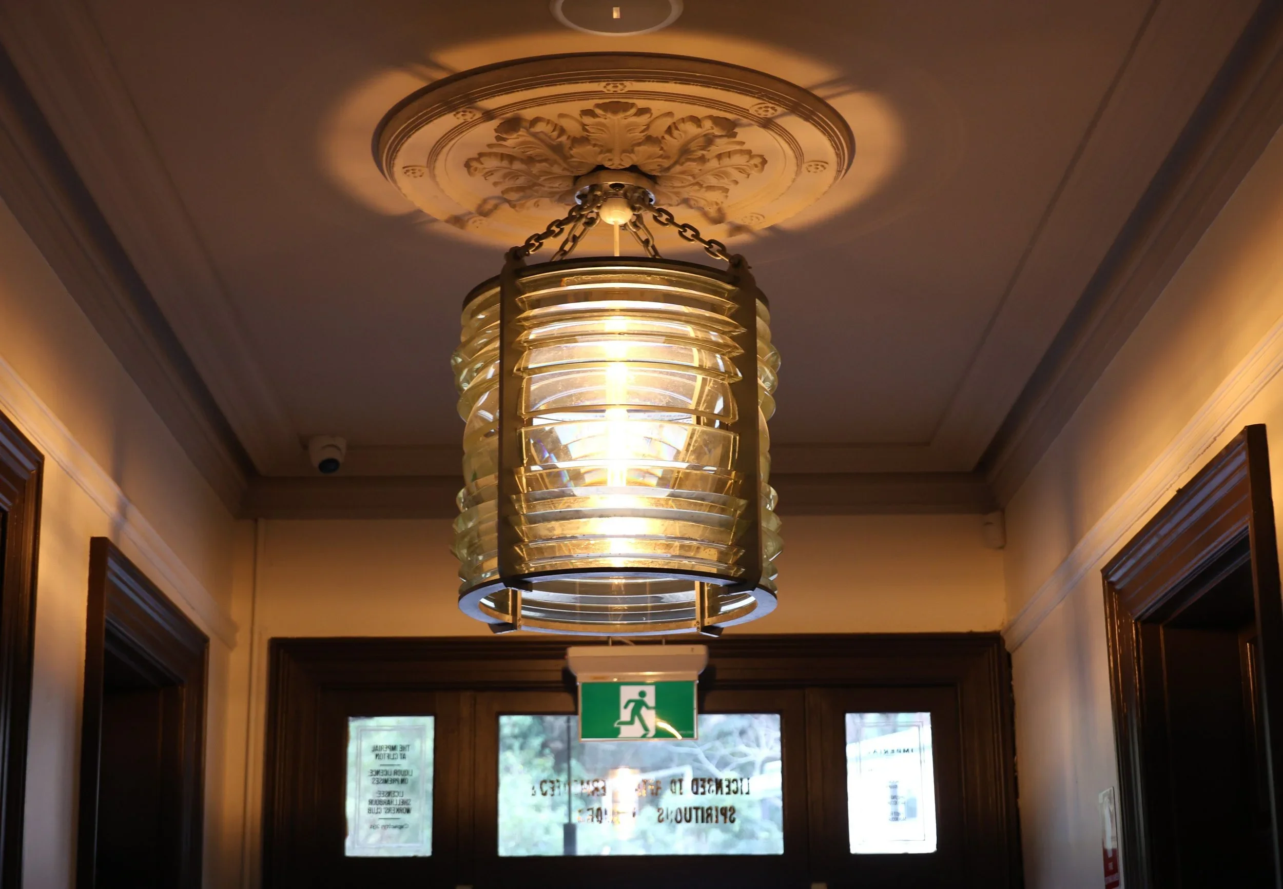 Repurposed lighthouse lens light fitting in the foyer of The Imperial Hotel Clifton