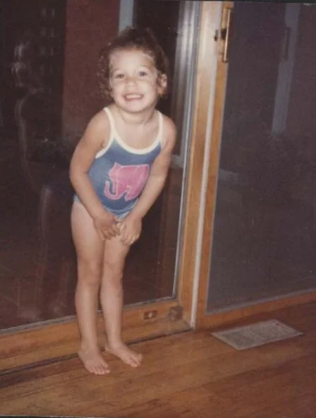 Me wearing my favorite elephant bathing suit (I still think the Pink Elephants song from "Dumbo" is one of the best things Disney has ever done), summer of 1983.