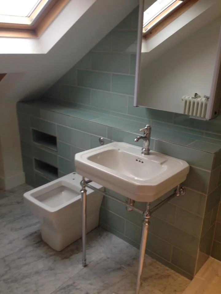 Freestanding sink unit with bidet and tiled bathroom wall unit - loft conversion bathroom installation