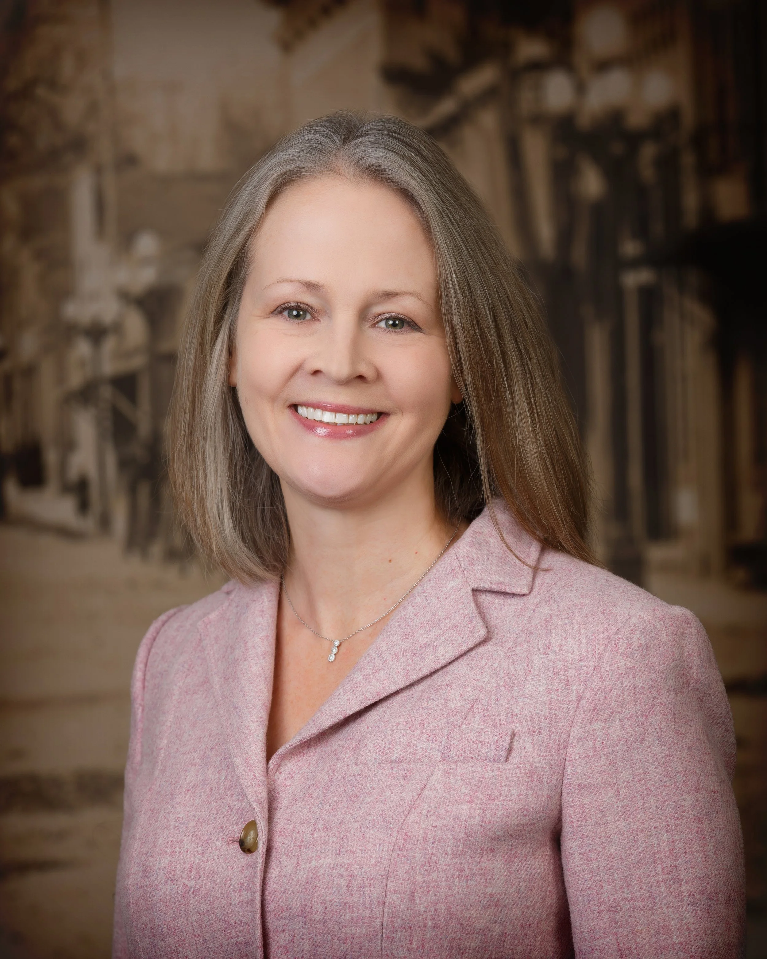 A headshot image of Courtney Johnson