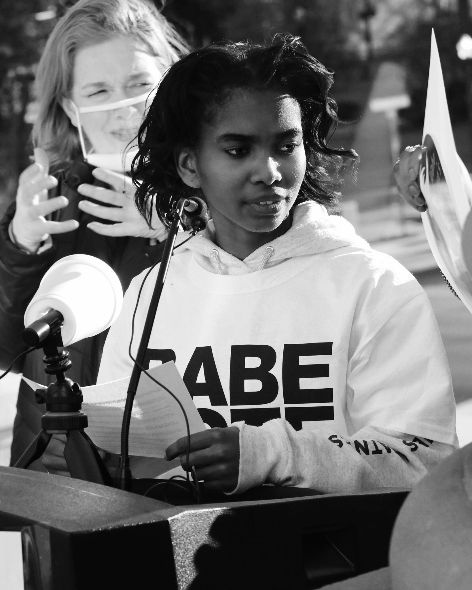 Former refugee & 1st-time voter, Rosina Machu speaking at Idaho Womxn's March