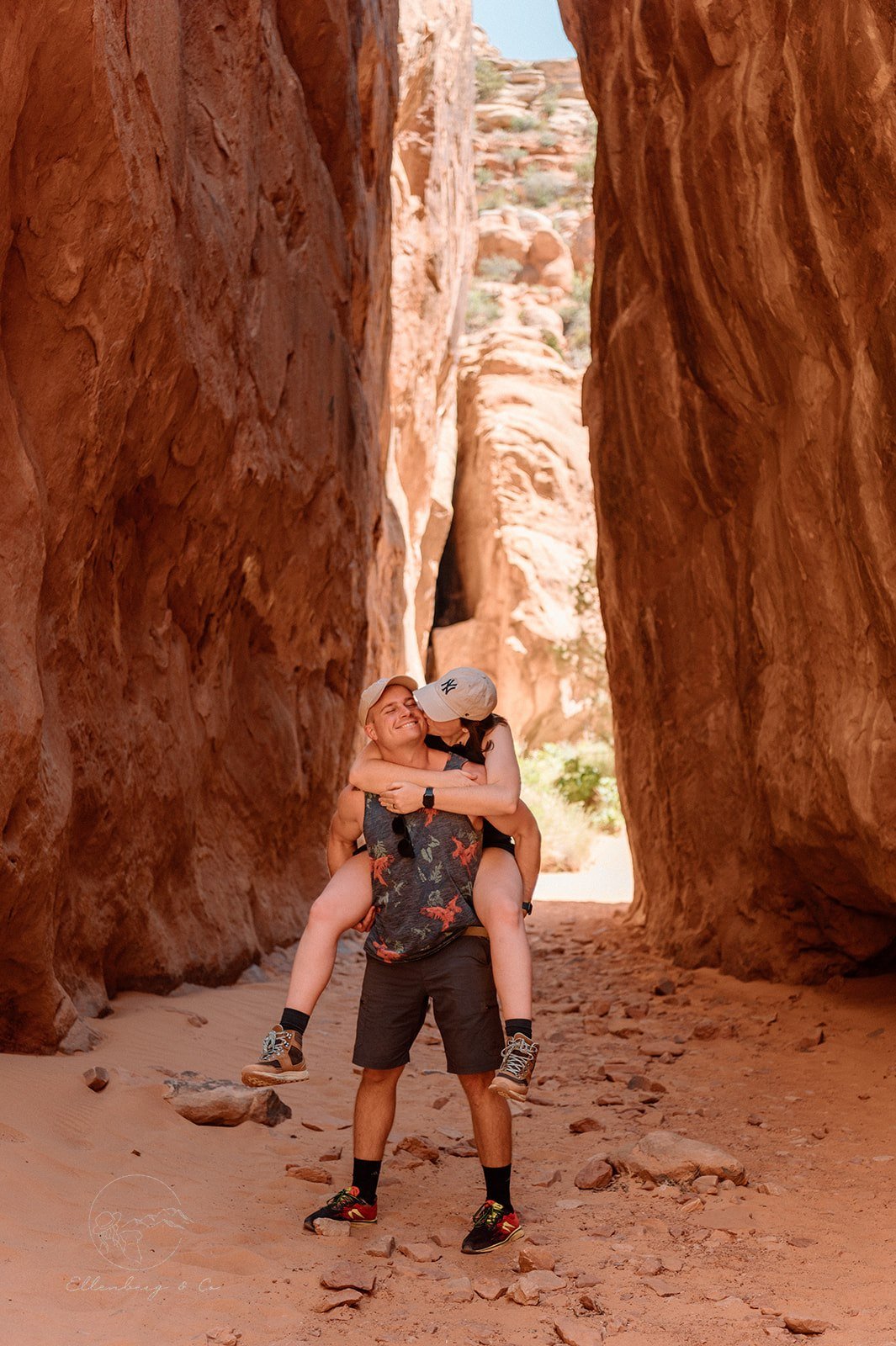  playful couples photo at arches national park, utah 