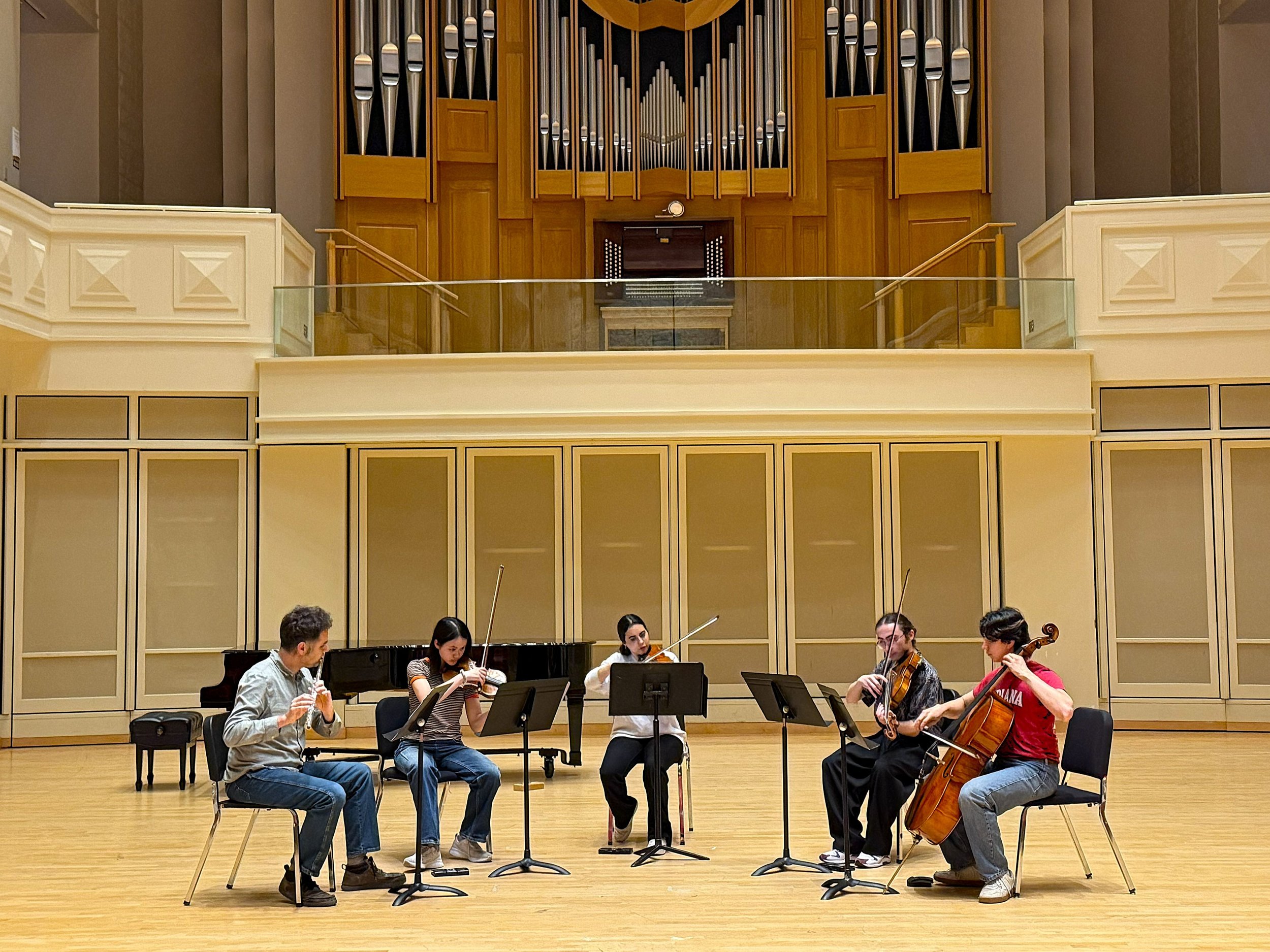 Daniel Cueto rehearsing with student string quartet in Auer Hall, IU Jacobs School, April 2026