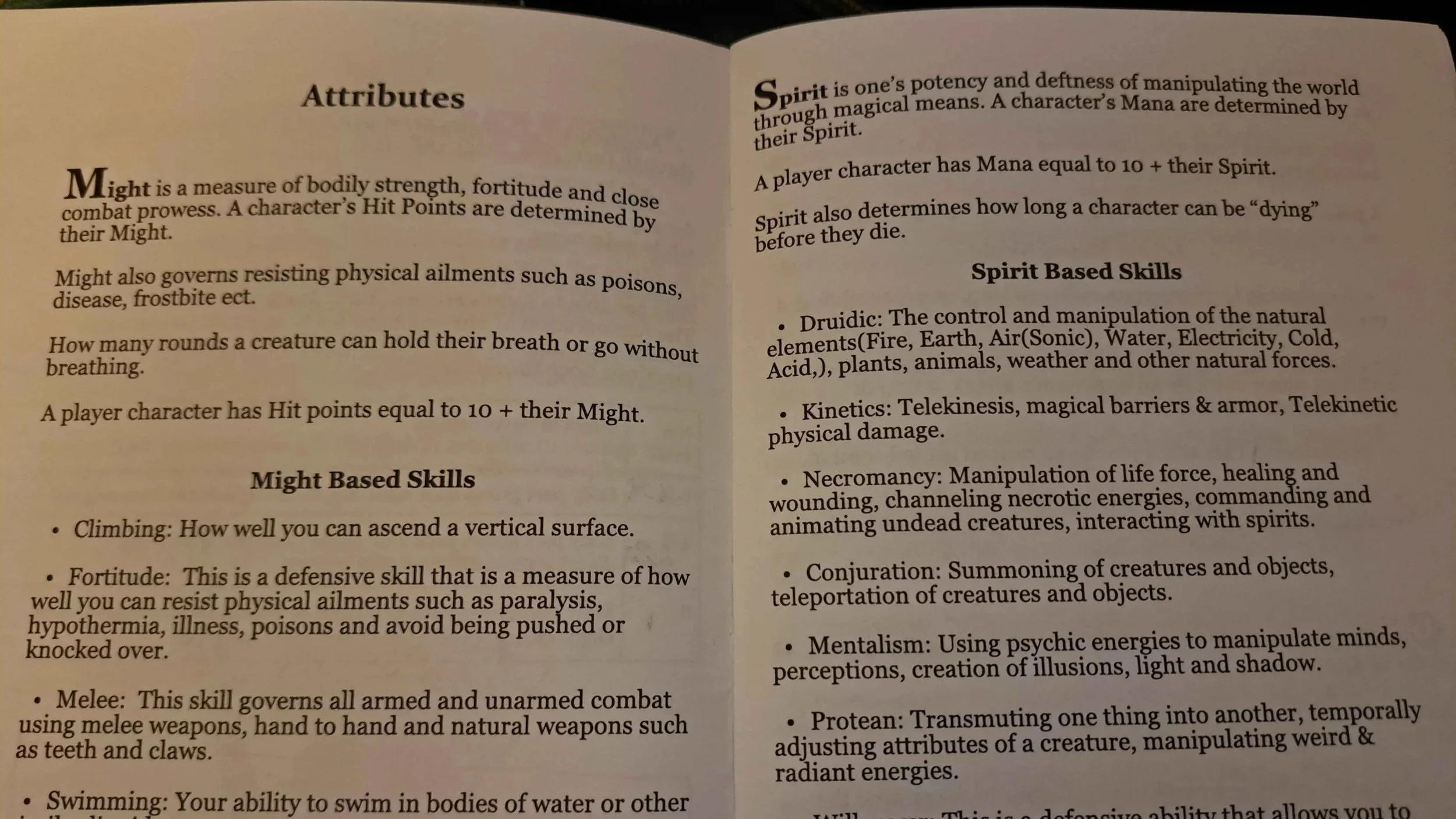 A photo of the printed test booklet showing a spread of infromation about character attributes.
