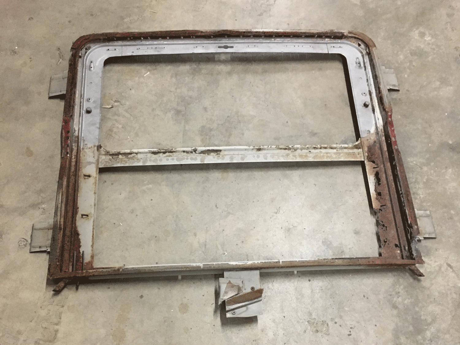 The damage to the frame (the sunroof track) was even worse than the roof itself.