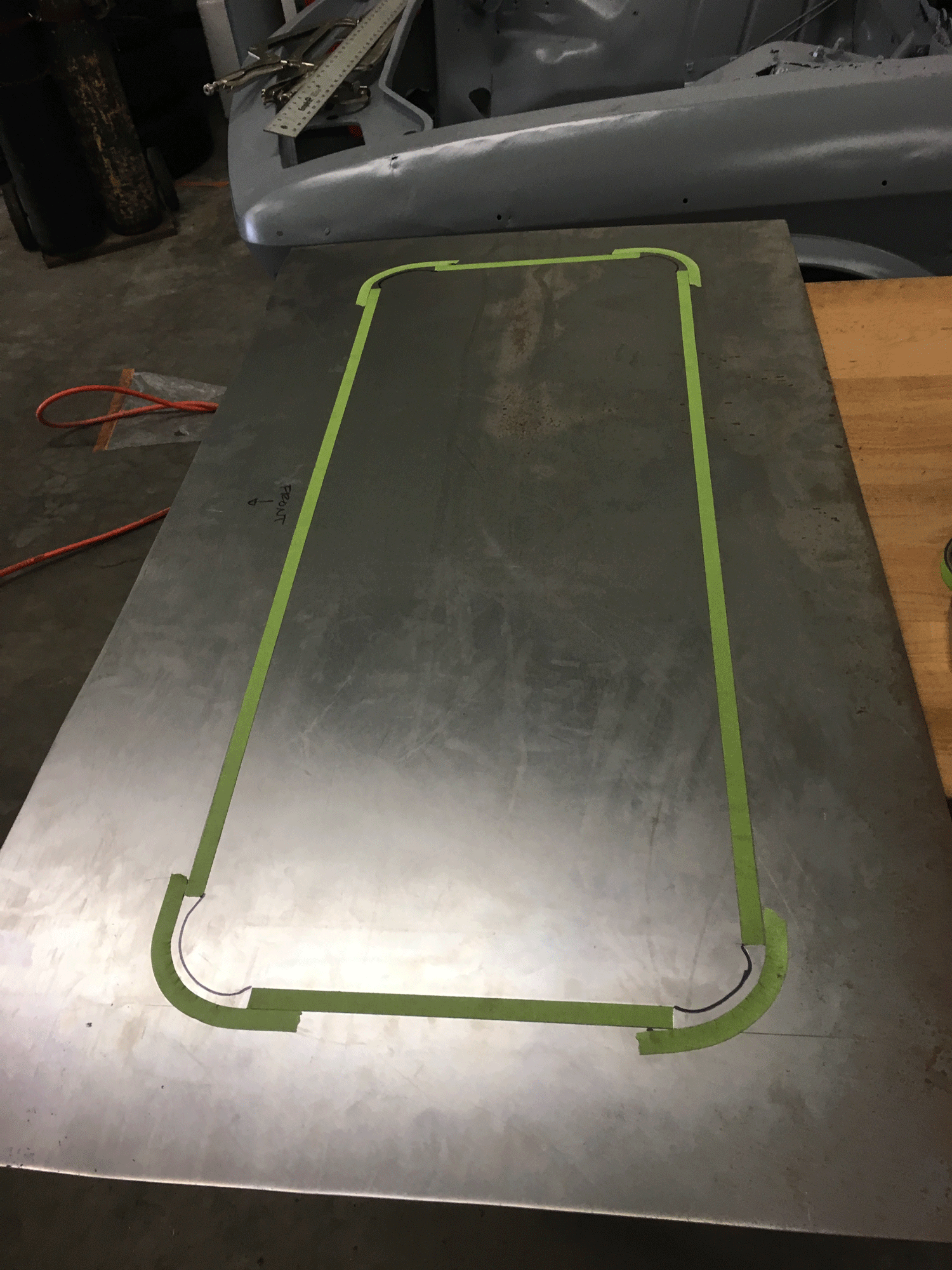Trace the sunroof hole and prep it for cutting.