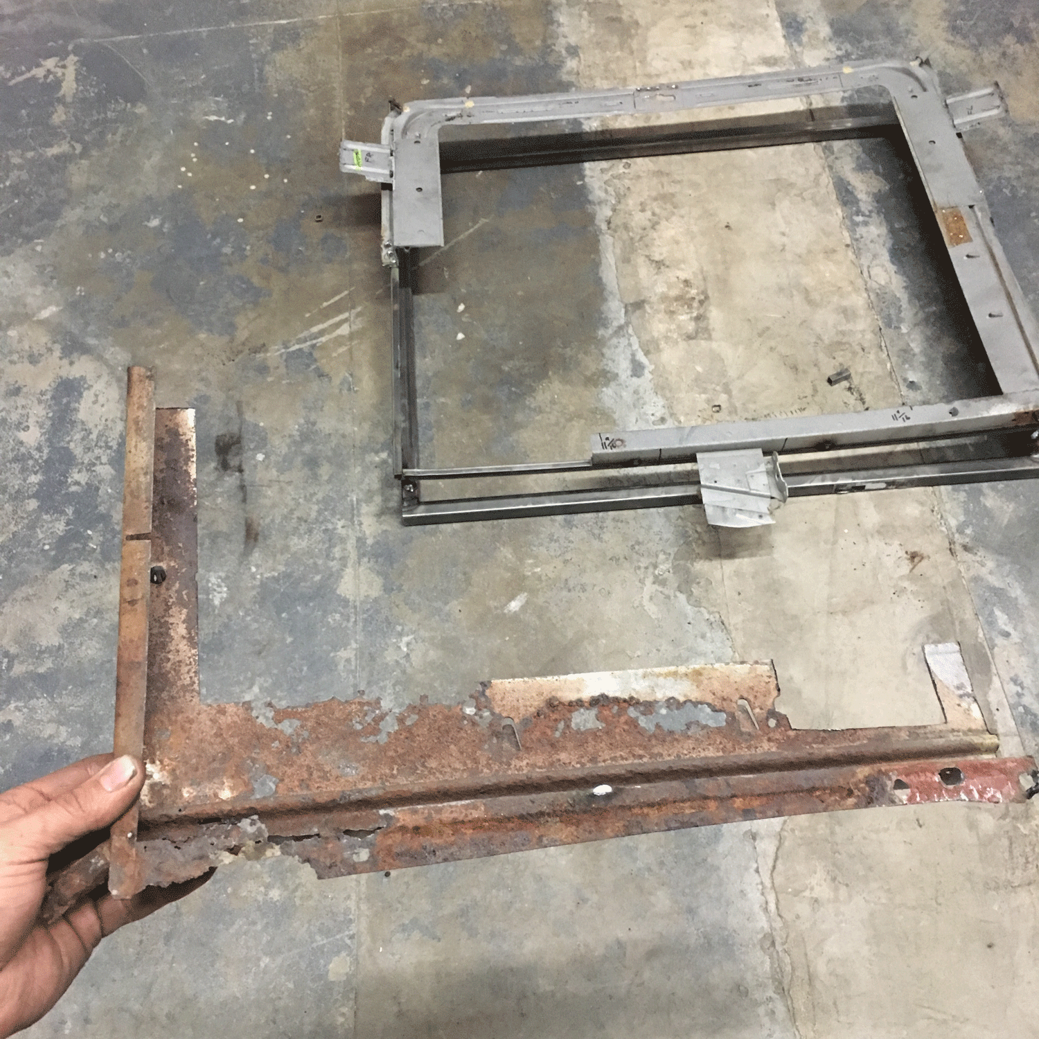 With the frame on the jig we can cut out sections and start replacing them.