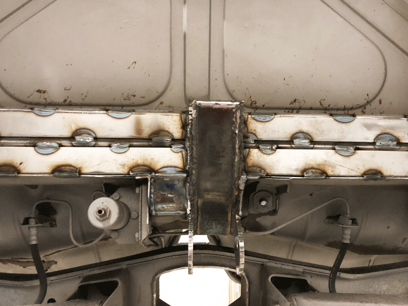 The front mount welded into the car.