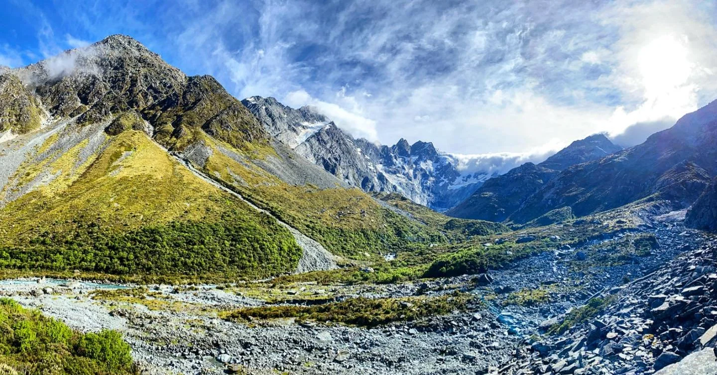 A stunning view into the upper reaches of the Copland River while hiking into the alpine.  Missing these summer days and exploring the alpine!  #hike #hiking #hikingadventures #newzealnd #newzealandtrip