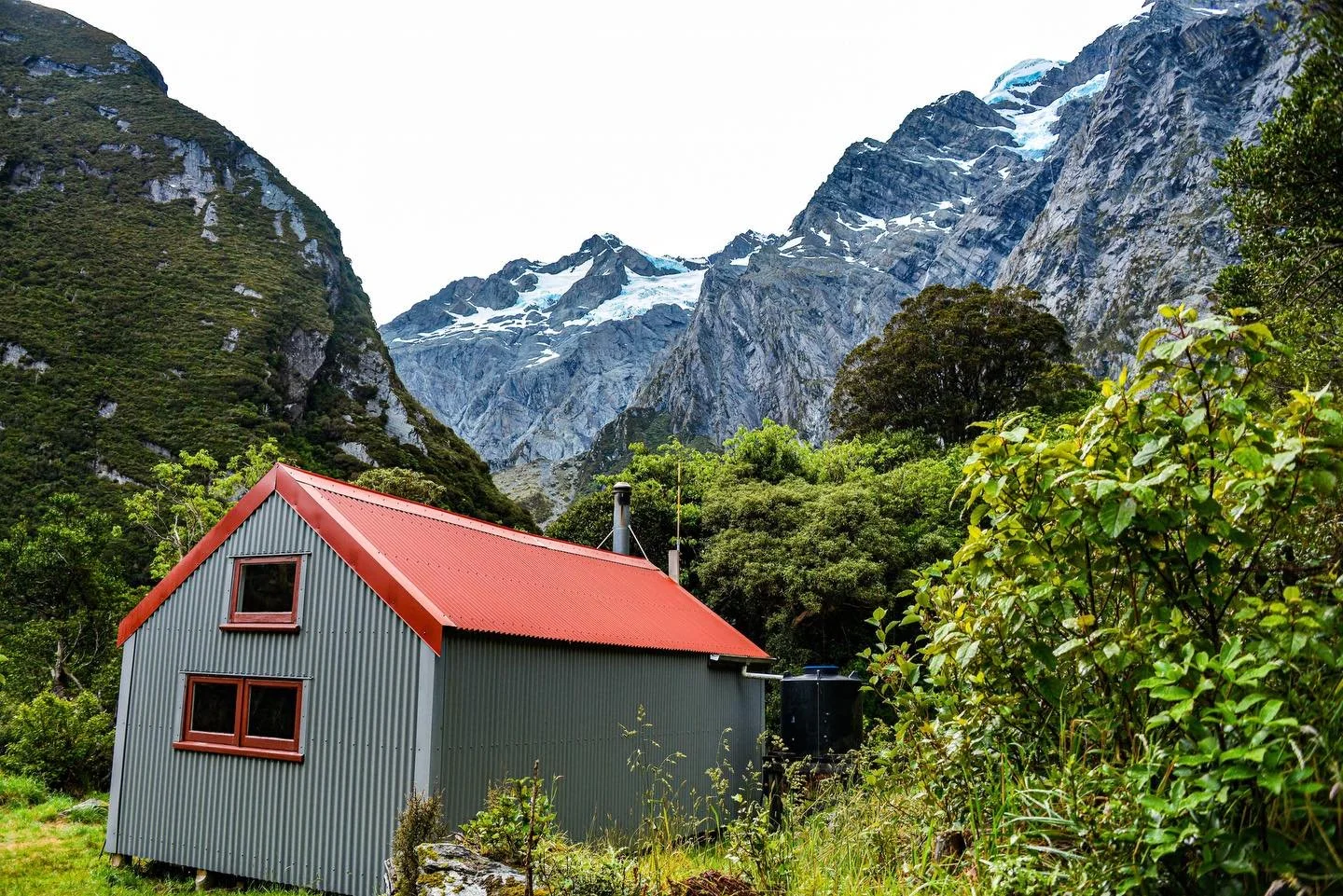 Our accommodations for a couple of nights in New Zealand.  Quite luxurious for backpacking standards, the setting and views were hard to beat too!  #hike #hiking #hikingadventures #newzeland #newzealandtrip