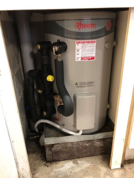 Small electric hot water system