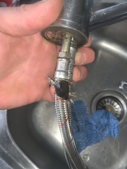 burst kitchen faucet supply line emergency