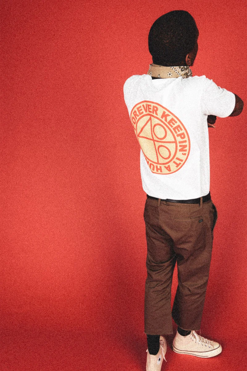  This FOREVER KEEPIN IT 100 graphic is based on Spike Lee’s ‘40 Acres and a Mule’ logo. Nods to black excellence are a must for 4Hunnid. 