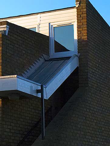 From within open shade we perceive the light as being neutral, but stepping back reveals it to be a deep shade of blue.