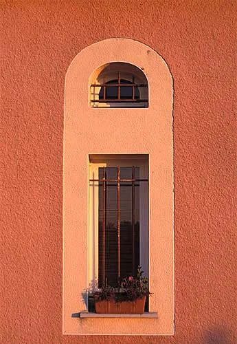 The texture of this wall is revealed by the light of the evening sun raking across it.