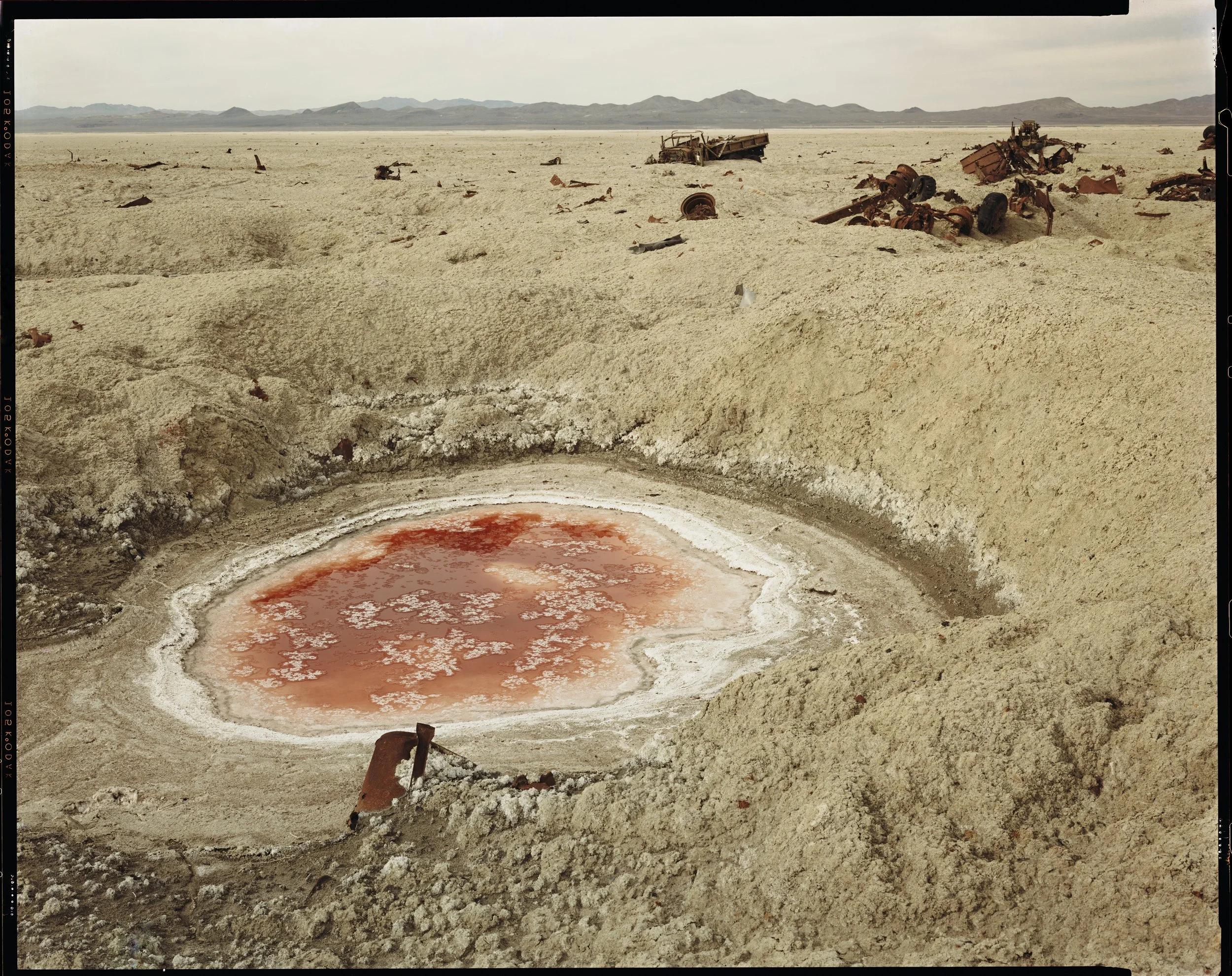 Bomb Crater and Destroyed Convoy, 1986.jpg