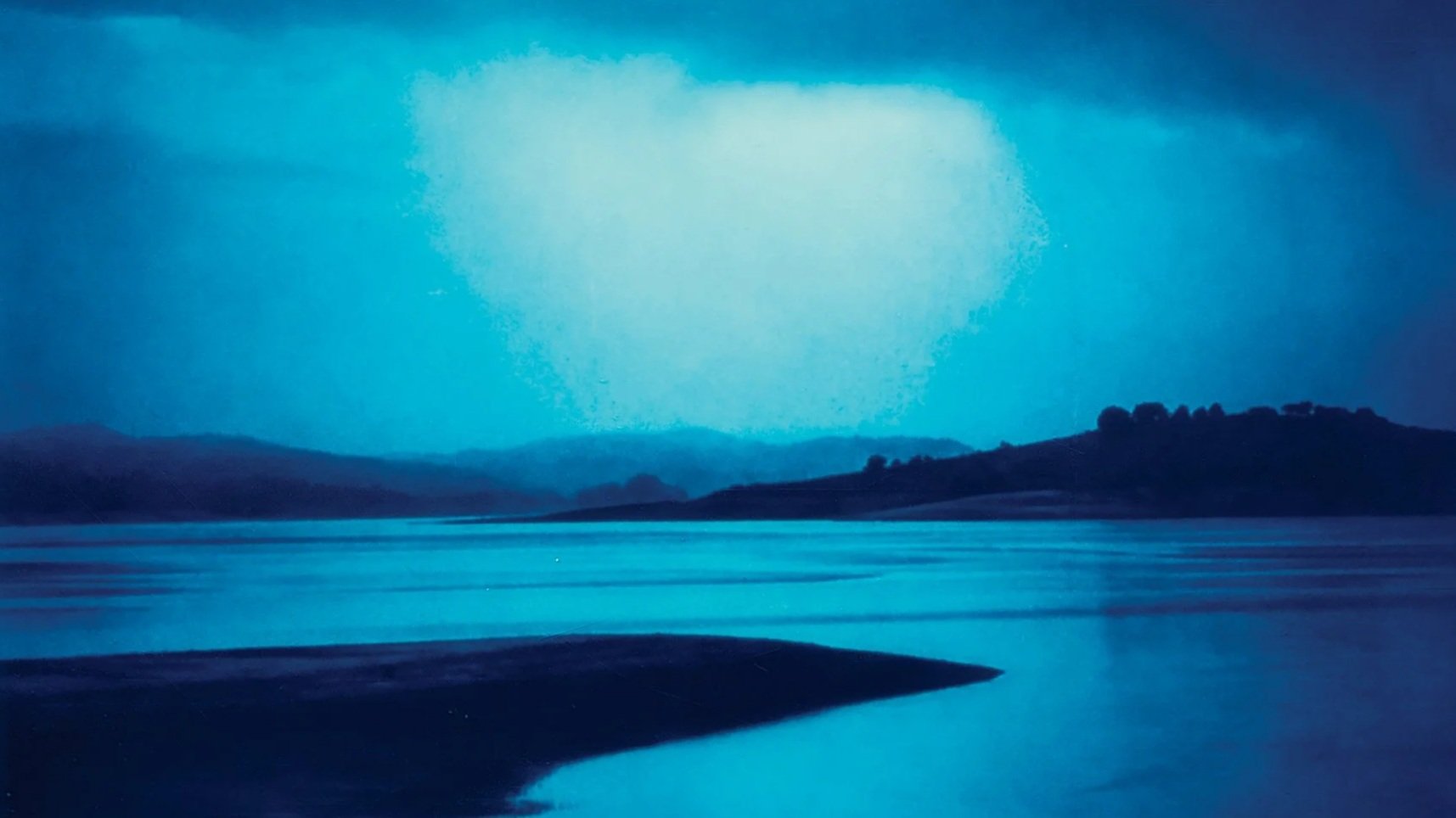 Michael Behlen Spent 3 Years Photographing Millerton Lake in Storms. The Result Is a Blue, Unstable Portrait of Water and Time