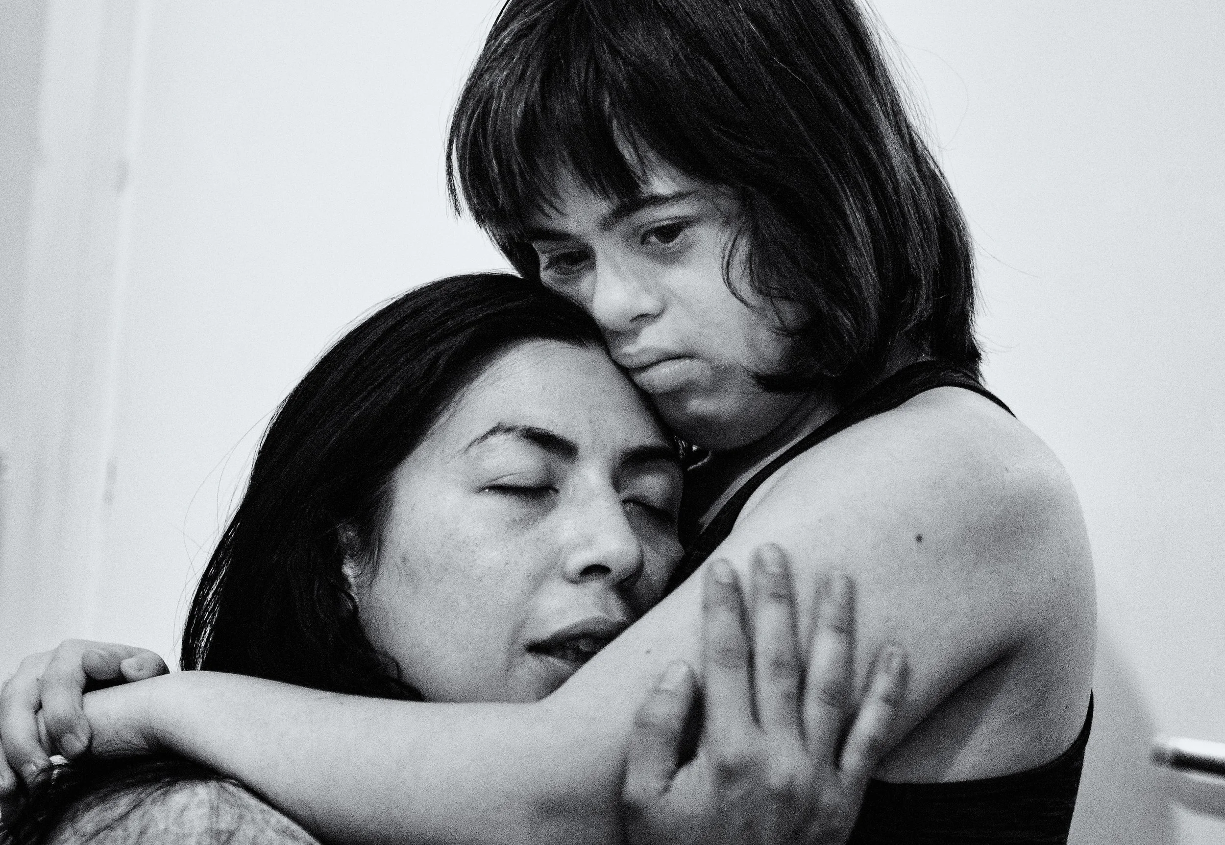 Maria embraces her mum Annalisa for comfort.jpg