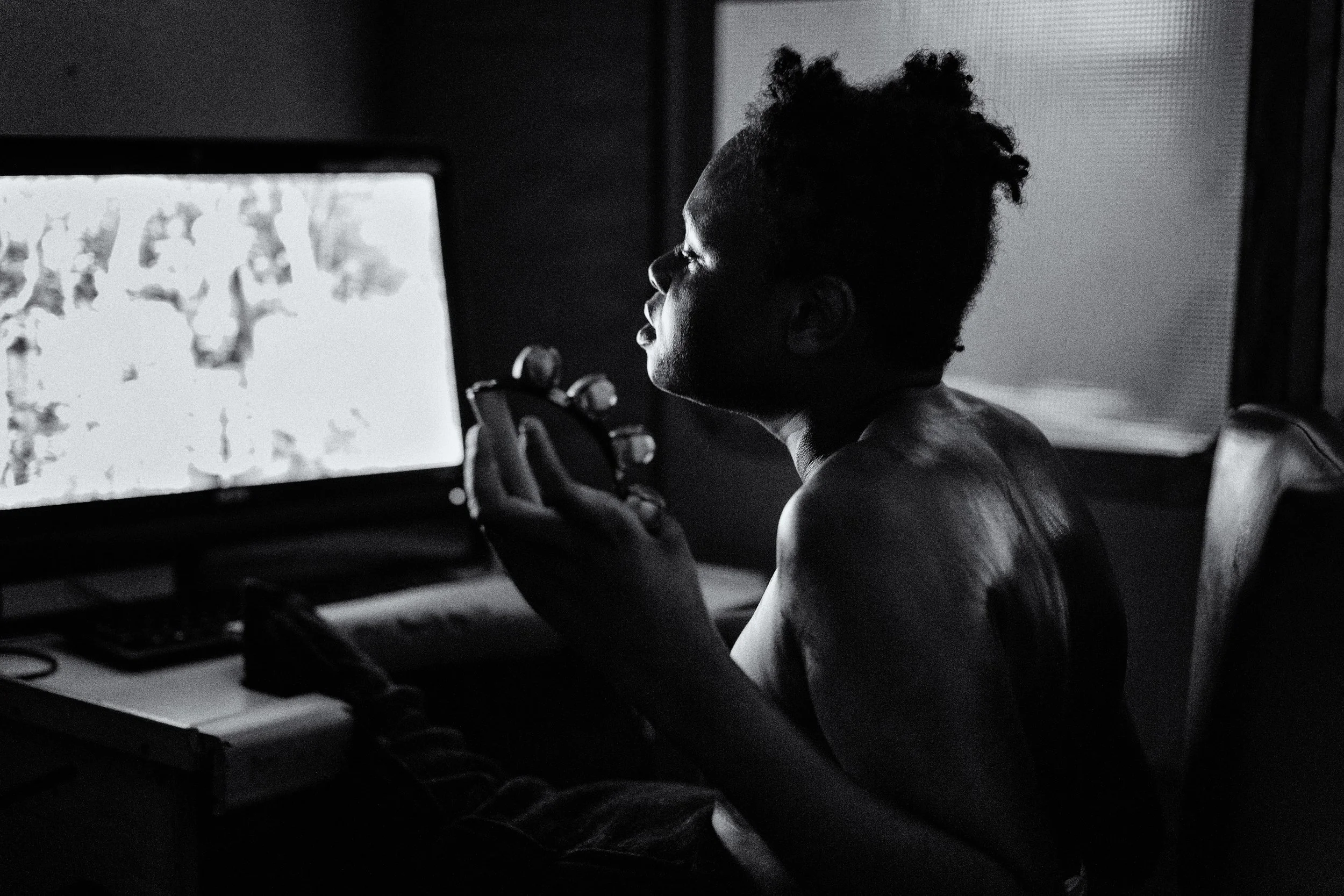 Mekhey at his specially programmed computer afte his evening bath.jpg