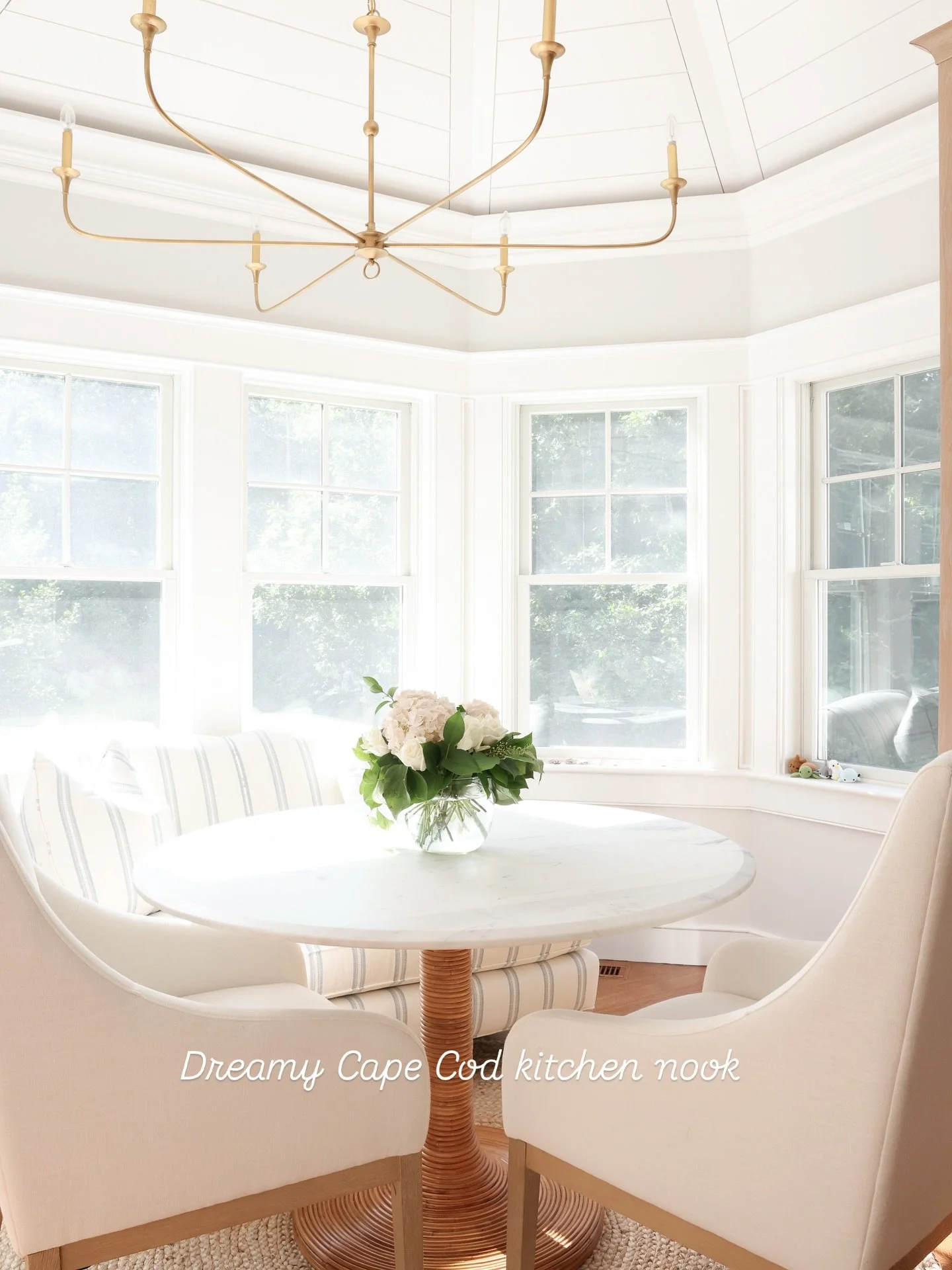 A soft spot for sunlight. We carved this kitchen nook to soak in every golden Cape Cod morning&mdash;with hydrangeas from the garden and slow coffee kind of vibes. 

#CoastalLiving #CapeCodStyle #BeachHouseVibes #CoastalHome #SeasideLiving #CoastalIn