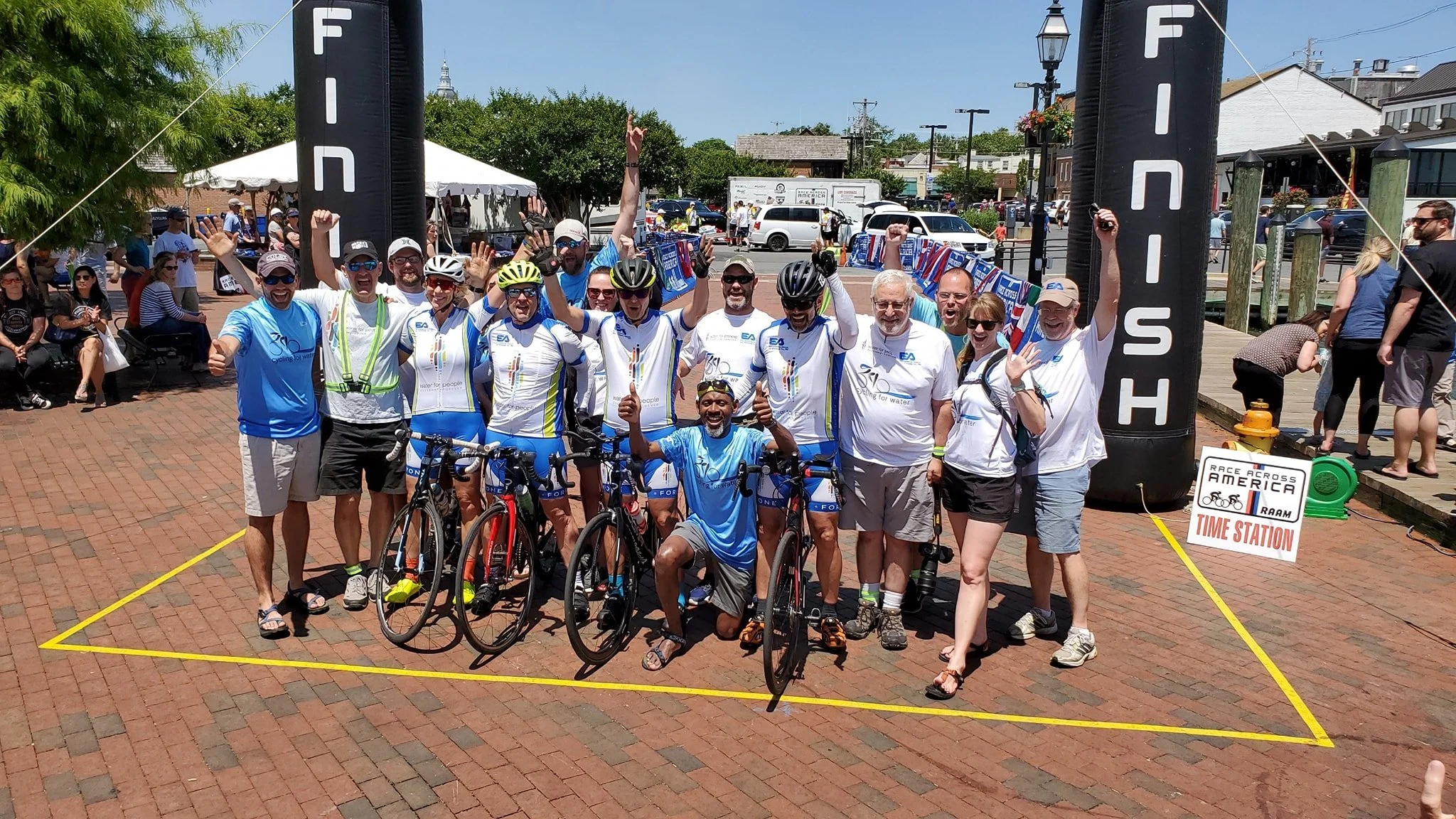 Finish Line_Full Team_Riders and Volunteers.jpg