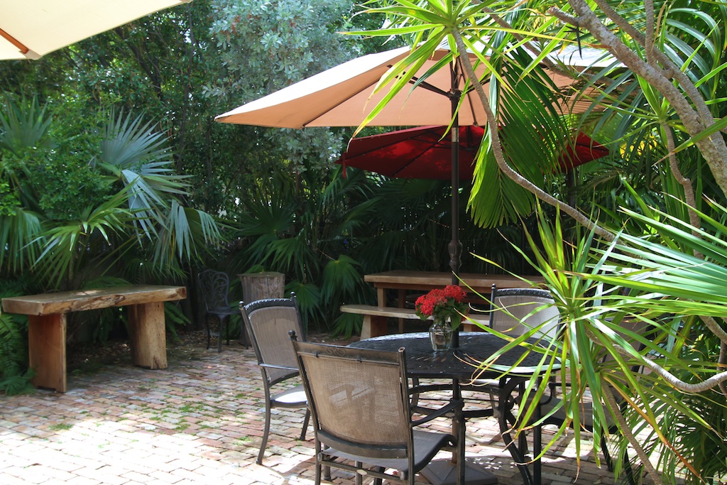 outdoors umbrella and chairs.