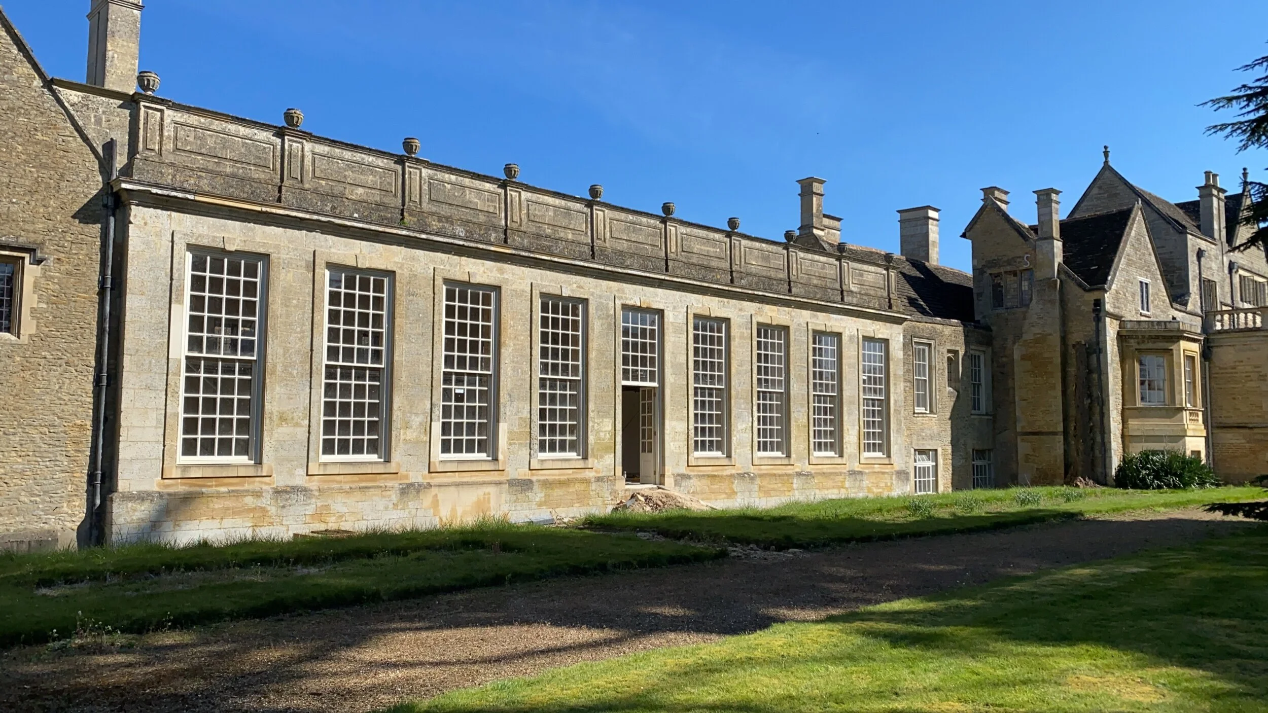 Plaster raised panel mouldings for large windows at Apethorpe Palace