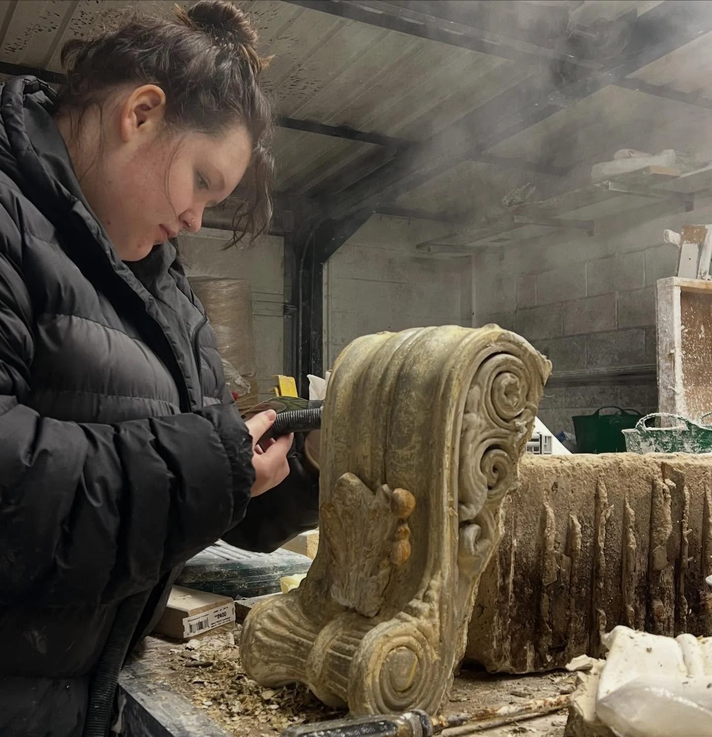 Our member of staff spend cold day at workshop hot air steaming off thick paint from large Victorian corbel for restoration project.  So that would be ready to make new rubber mould out of it.