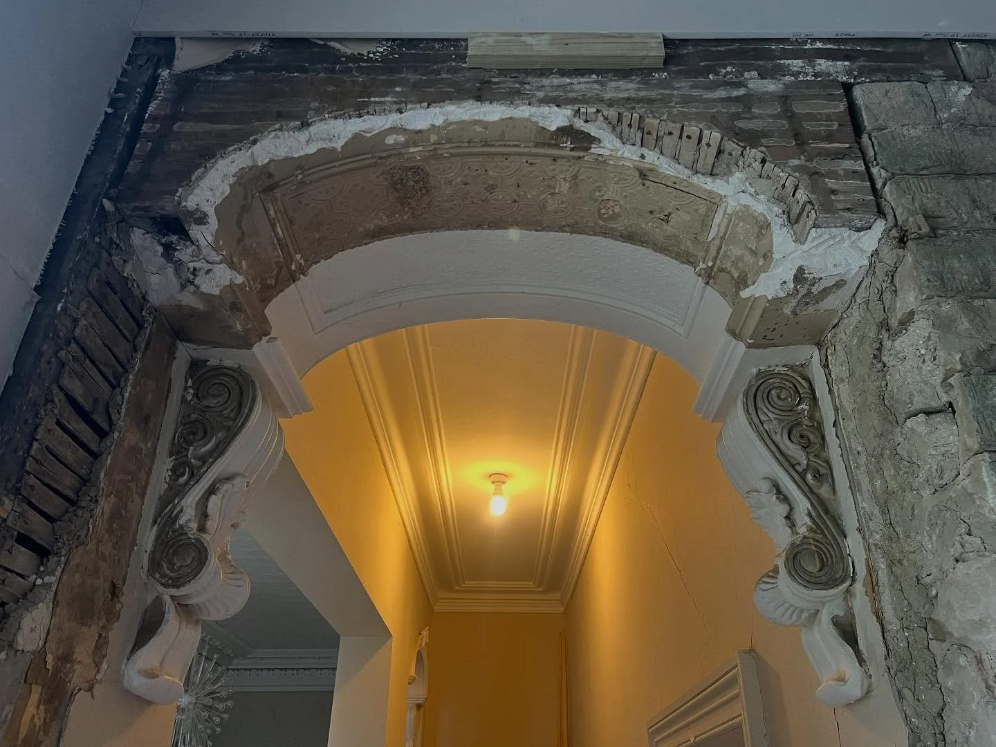 Elliptical arch template taken , corbels, motif  taken down and new arch to be completely made new at workshop plus corbels stripped off paint and remould.  Should be interesting project