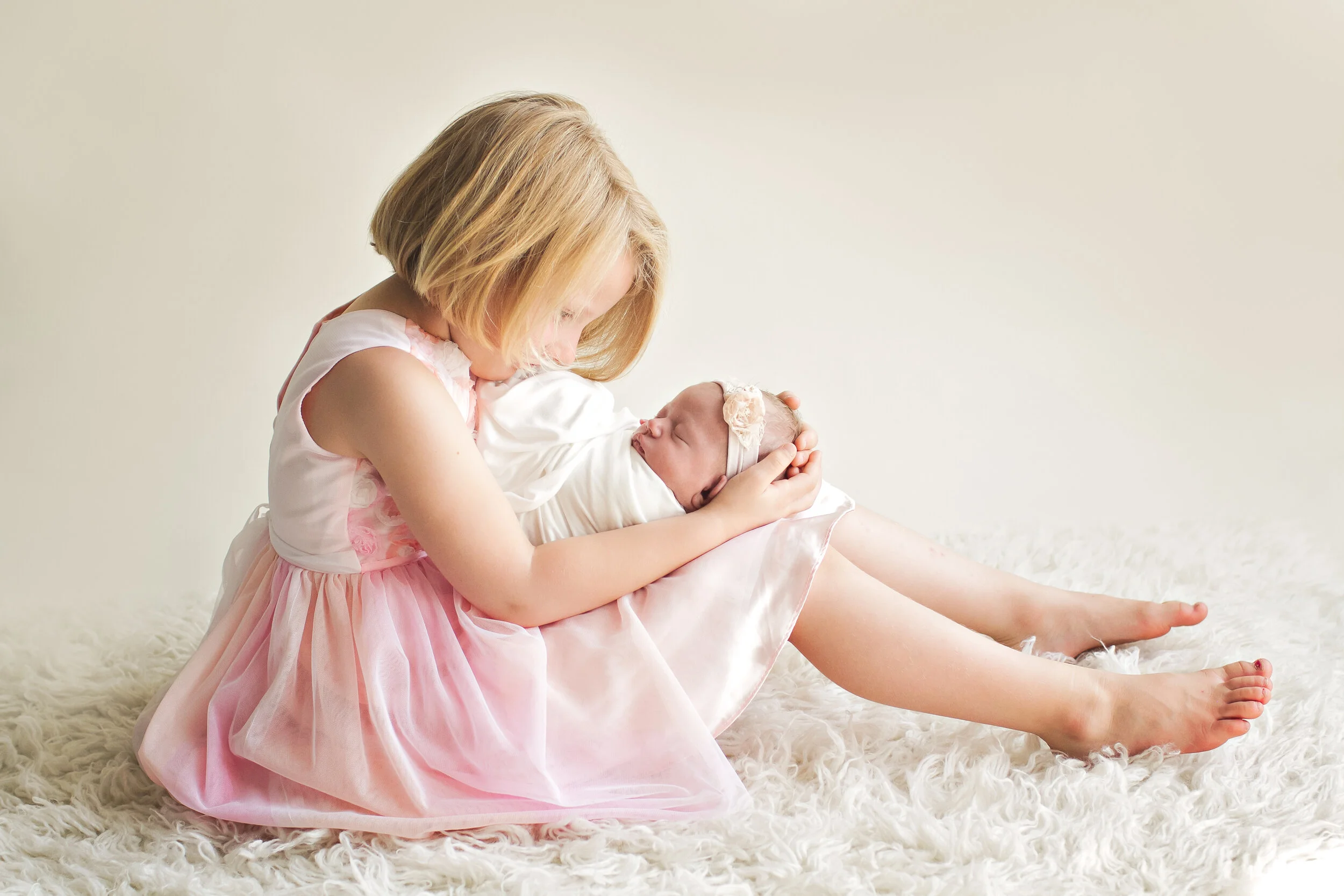 Caroline holding Evelyn.jpg
