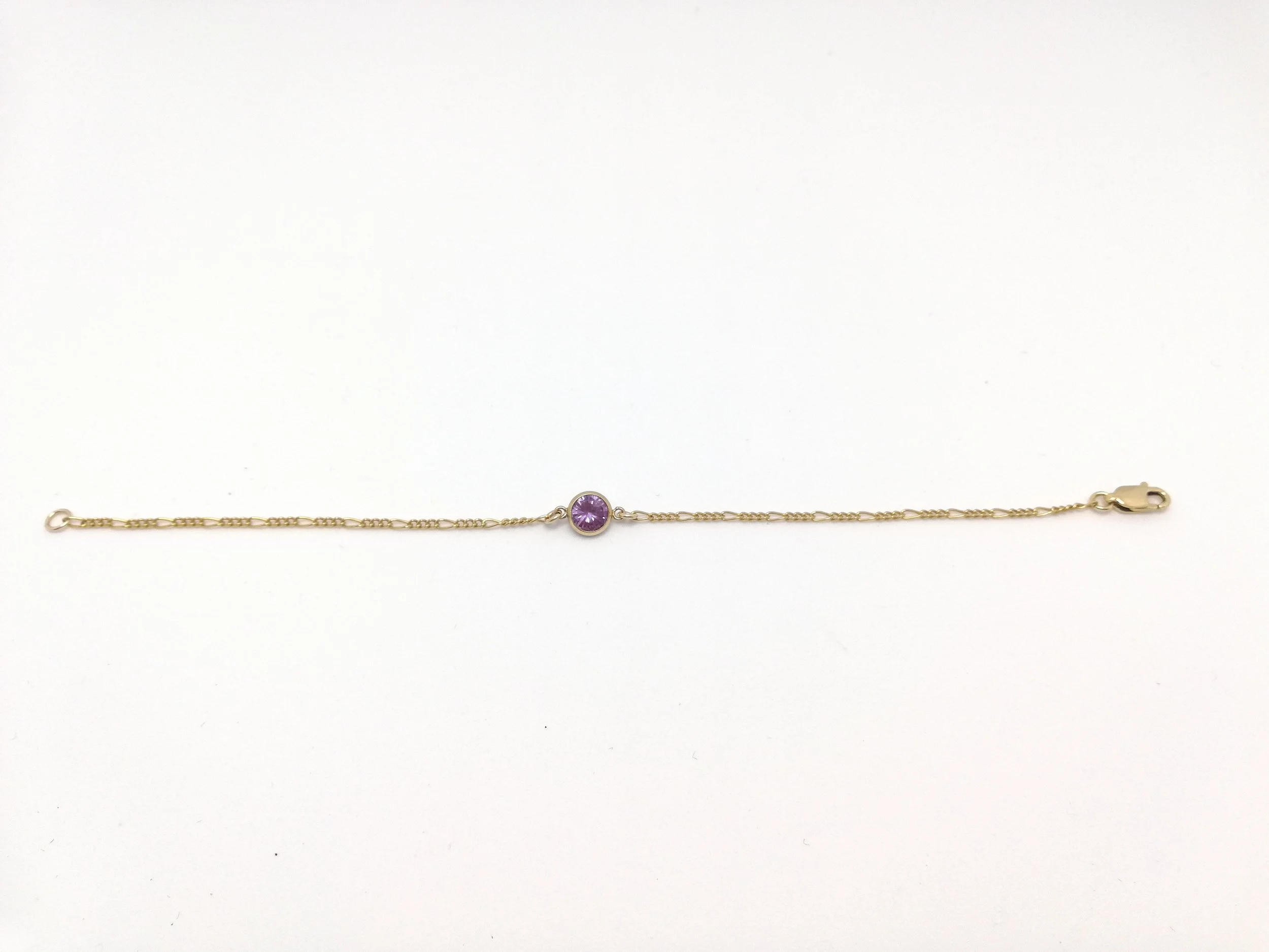 dainty friendship bracelet in purple zirconia and 14ct yellow gold fill