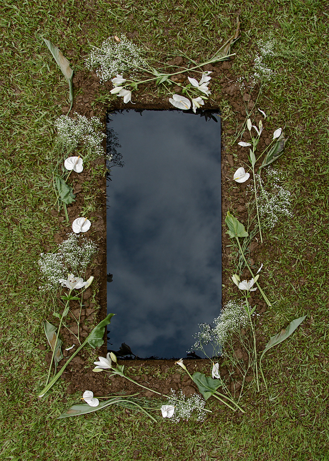 "Reflective Burial" artist's grave, black mirror, flowers 3 ft. wide x 8 ft deep. x 8 ft. long