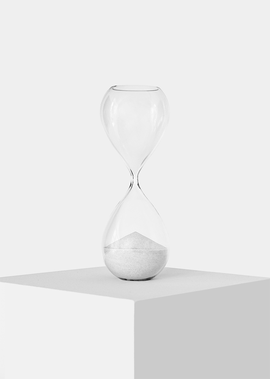 "First Instance (The Beginning)" open hand-blown hourglass, white sand 15 in. tall 2012