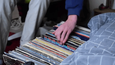 he sleeps in a room overflowing with vinyl