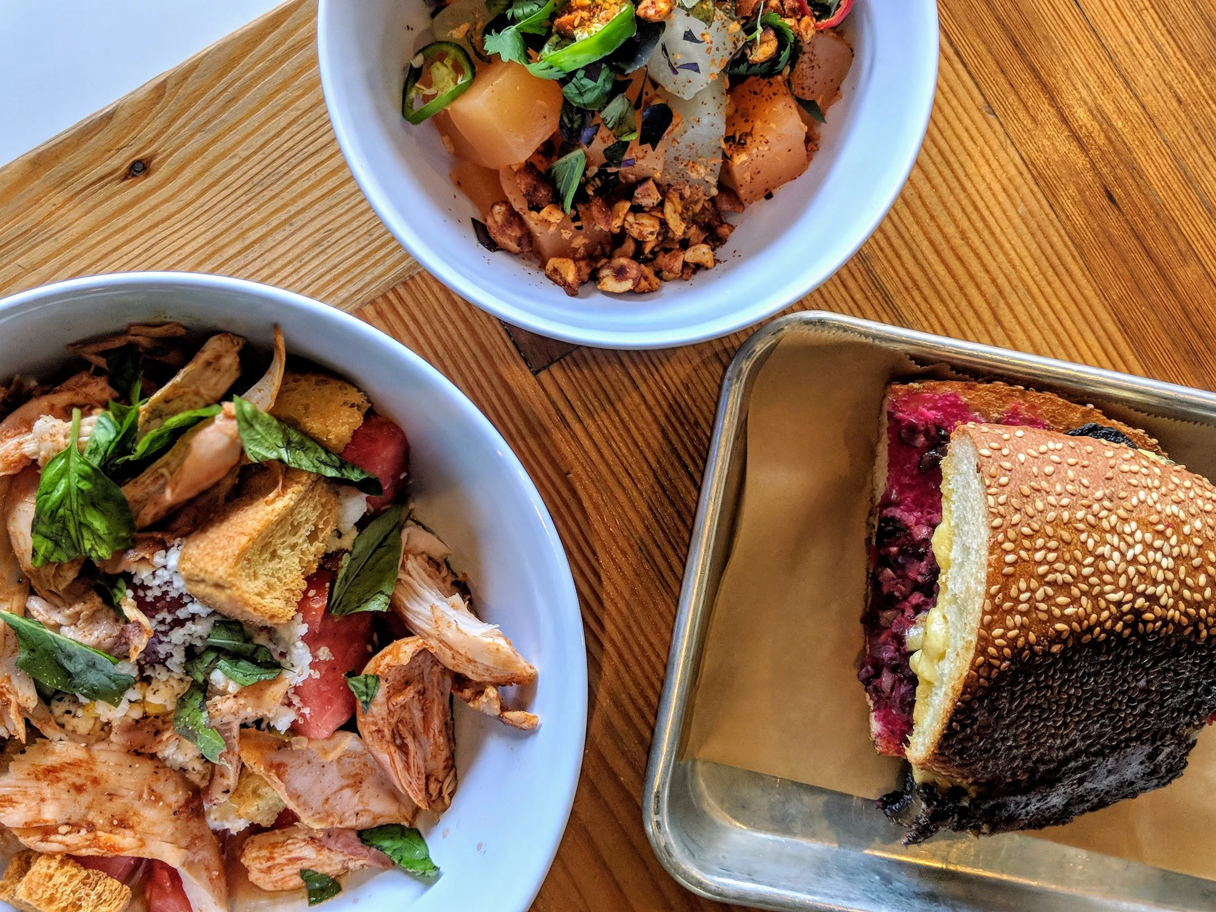 Tomato & Korn salad, pressed melon, and Smoked Mushroom Muffaletta